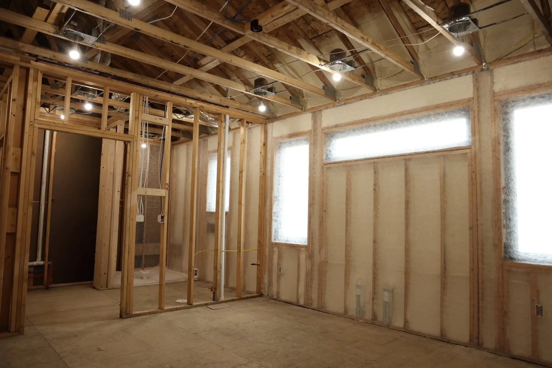Open-cell spray foam on interior walls and ceiling