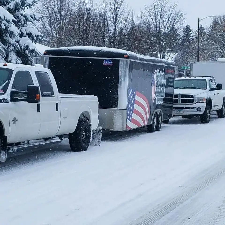 United Spray Foam trucks and trailer in Minnesota snow